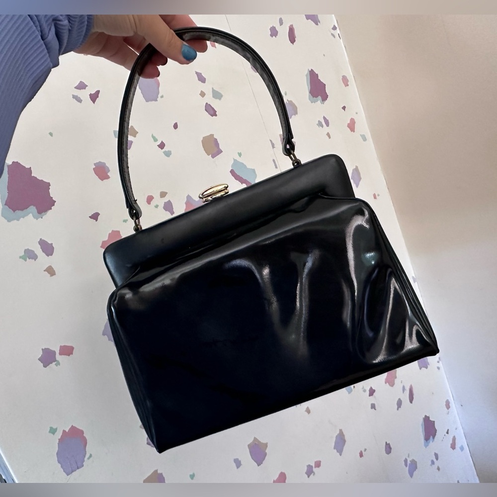 Vintage Dutchess patent leather bag